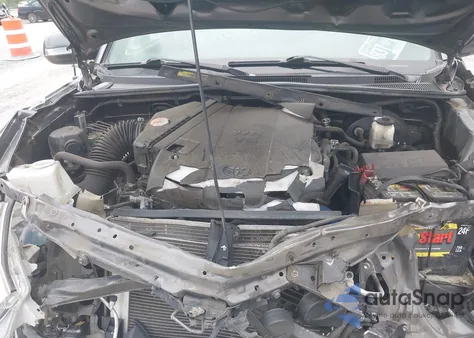 2015 Toyota Tacoma Base V6 из США, поврежденный, VIN 5TFMU4FN9FX030176